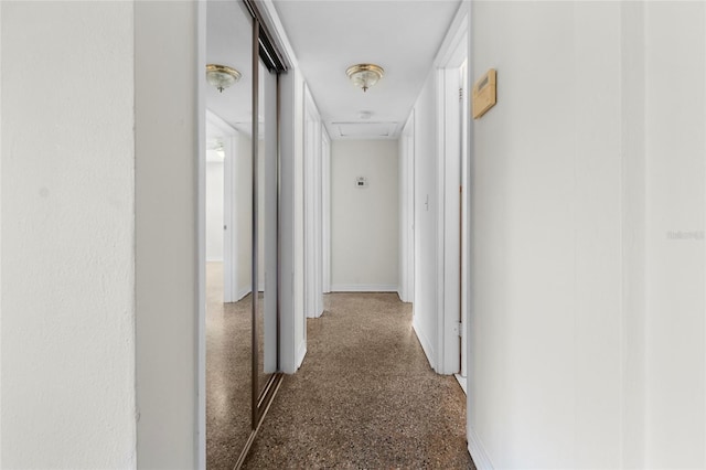 1340 Continental Dr, Daytona Beach, FL 32117 - corridor with baseboards and attic access