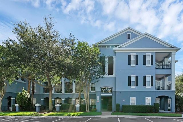 3561 Conroy Rd Unit 216, Orlando, FL 32839 - view of property with uncovered parking