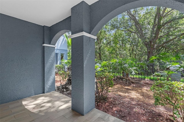3561 Conroy Rd Unit 216, Orlando, FL 32839 - exterior view of stucco siding and arched walkways