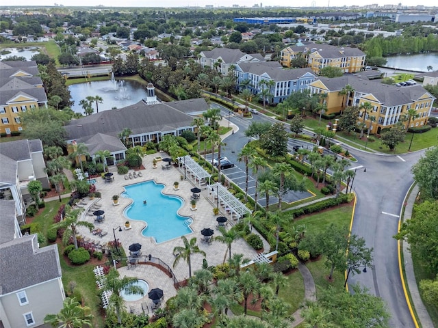3561 Conroy Rd Unit 216, Orlando, FL 32839 - aerial view of property and surrounding area featuring a pool, a nearby body of water, and nearby suburban area