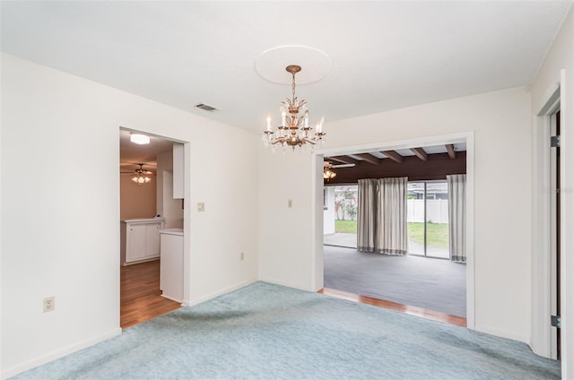 1322 Royal Birkdale Cir, Rockledge, FL 32955 - carpeted spare room with a chandelier, baseboards, and ceiling fan