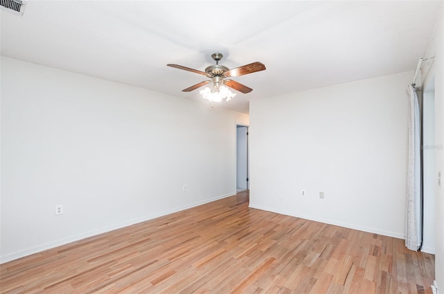 1322 Royal Birkdale Cir, Rockledge, FL 32955 - unfurnished room with a ceiling fan, light wood-type flooring, and baseboards