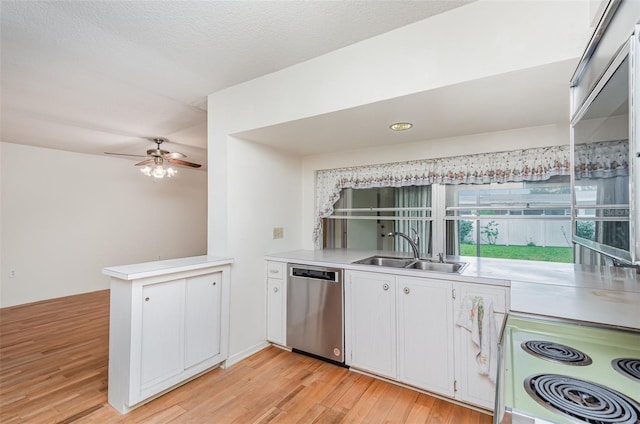 1322 Royal Birkdale Cir, Rockledge, FL 32955 - kitchen featuring stainless steel dishwasher, a sink, light wood-style floors, a ceiling fan, and electric range oven
