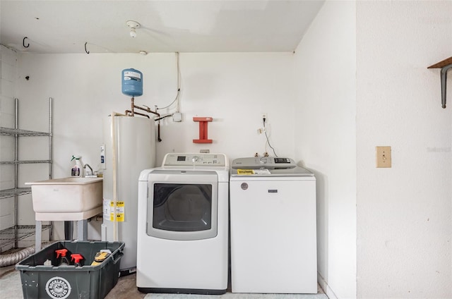 1322 Royal Birkdale Cir, Rockledge, FL 32955 - laundry area with water heater and independent washer and dryer
