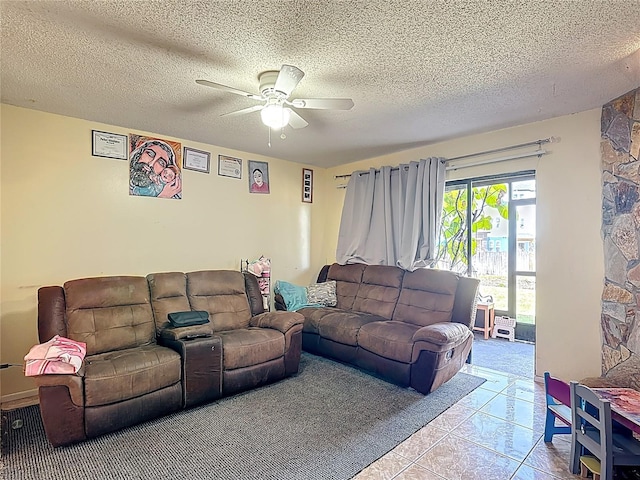 1806 Foxhall Cir Unit 1806, Kissimmee, FL 34741 - living room with a ceiling fan, a textured ceiling, and light tile patterned floors