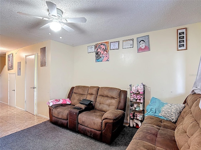 1806 Foxhall Cir Unit 1806, Kissimmee, FL 34741 - tiled living room with a ceiling fan, a textured ceiling, and carpet