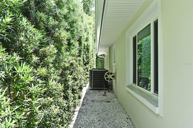 507 N Peninsula Ave, New Smyrna Beach, FL 32169 - view of side of property featuring central AC unit