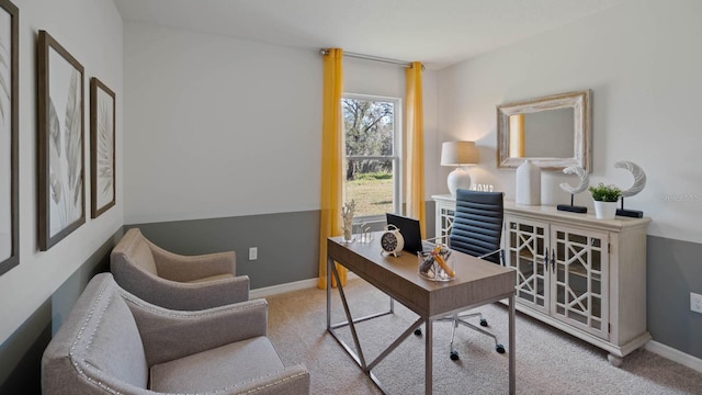 office space with carpet and baseboards