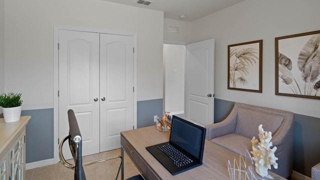 home office with light colored carpet