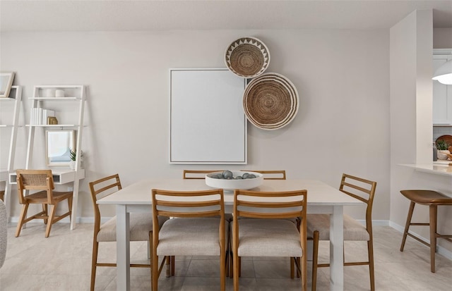 dining area with baseboards