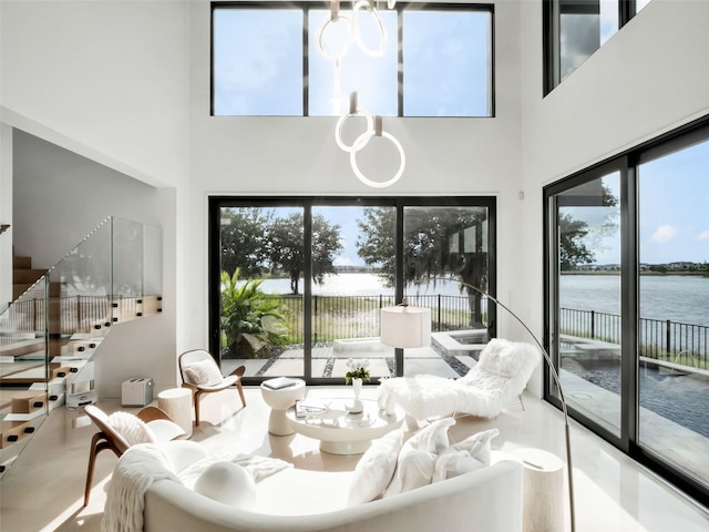 8157 Elion St, Orlando, FL 32827 - dining room with a high ceiling and a water view