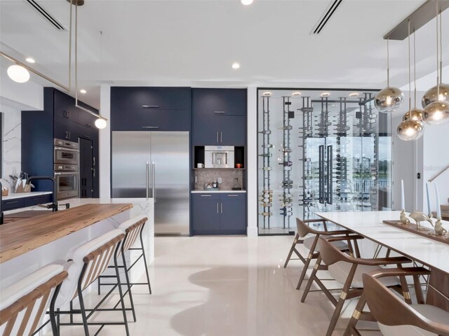 8157 Elion St, Orlando, FL 32827 - dining area featuring recessed lighting and bar
