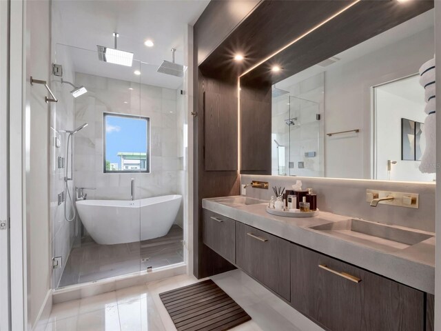 8157 Elion St, Orlando, FL 32827 - full bath with a stall shower, double vanity, and a freestanding bath