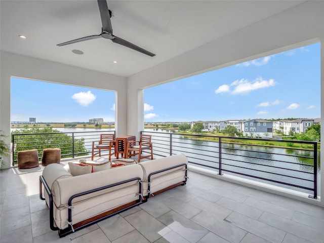 8157 Elion St, Orlando, FL 32827 - view of patio featuring a water view, a ceiling fan, and a balcony