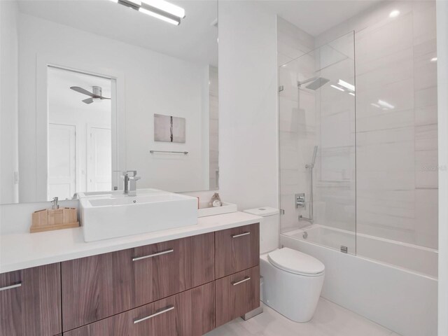 8157 Elion St, Orlando, FL 32827 - bathroom featuring toilet, bathtub / shower combination, vanity, and ceiling fan