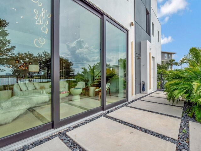 8157 Elion St, Orlando, FL 32827 - view of exterior entry with stucco siding