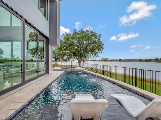 8157 Elion St, Orlando, FL 32827 - view of swimming pool with a fenced backyard, a water view, and a pool with connected hot tub