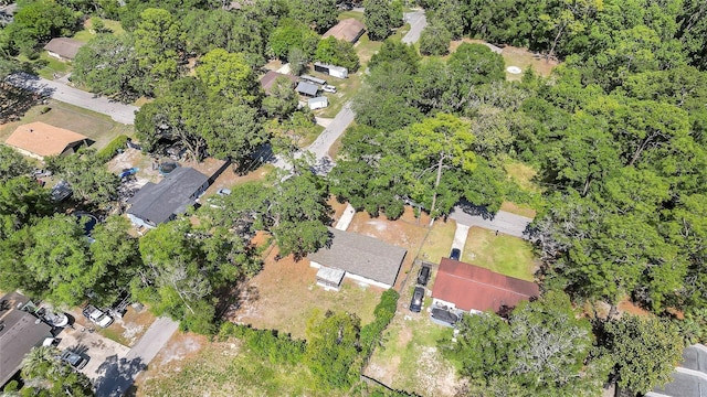aerial overview of property's location with nearby suburban area