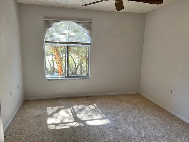 5291 Images Cir Unit 301, Kissimmee, FL 34746 - unfurnished room with a ceiling fan and carpet flooring