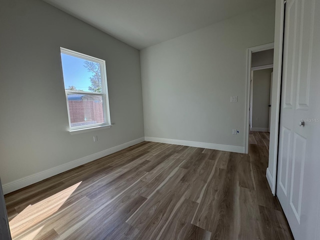 2336 SW 168th Loop, Ocala, FL 34473 - unfurnished room with wood finished floors and baseboards