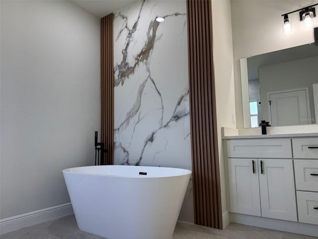 2336 SW 168th Loop, Ocala, FL 34473 - full bathroom with baseboards, vanity, and a freestanding bath
