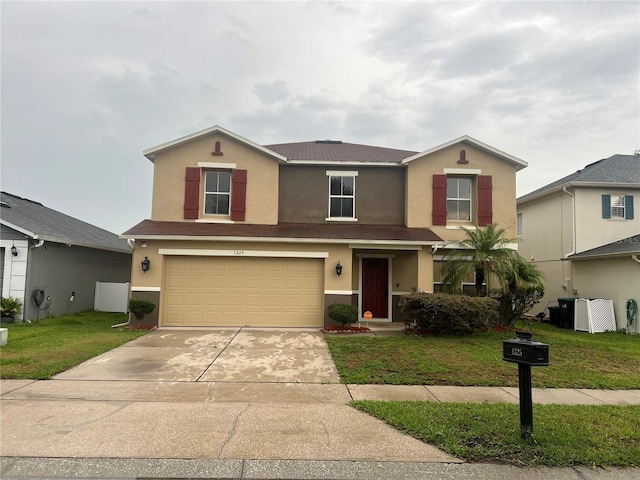 1325 Bella Coola Dr, Orlando, FL 32828 - traditional-style house with stucco siding, concrete driveway, a front yard, and a garage