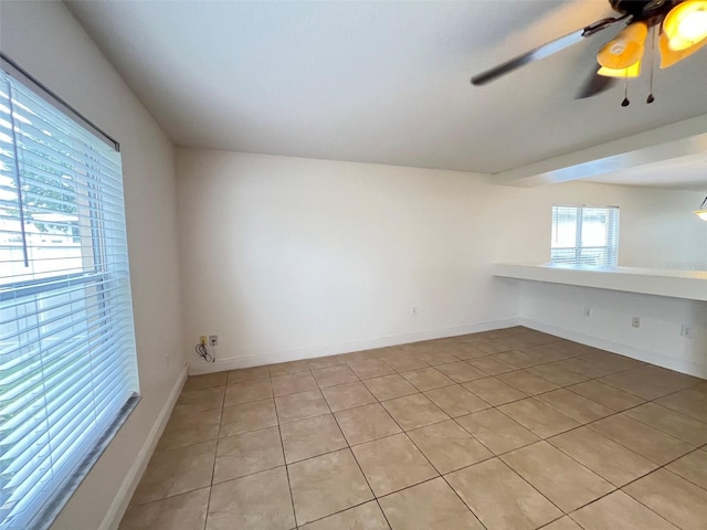 1325 Bella Coola Dr, Orlando, FL 32828 - spare room featuring light tile patterned floors and ceiling fan