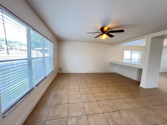 1325 Bella Coola Dr, Orlando, FL 32828 - spare room featuring light tile patterned flooring and a ceiling fan