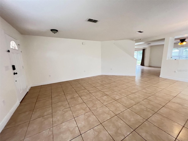1325 Bella Coola Dr, Orlando, FL 32828 - spare room featuring light tile patterned floors and baseboards