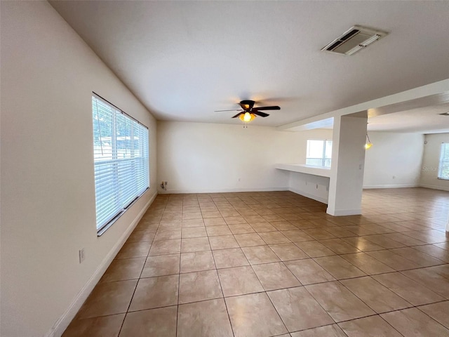 1325 Bella Coola Dr, Orlando, FL 32828 - spare room featuring light tile patterned floors and a ceiling fan