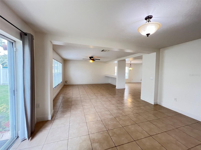 1325 Bella Coola Dr, Orlando, FL 32828 - unfurnished room featuring light tile patterned floors and a ceiling fan