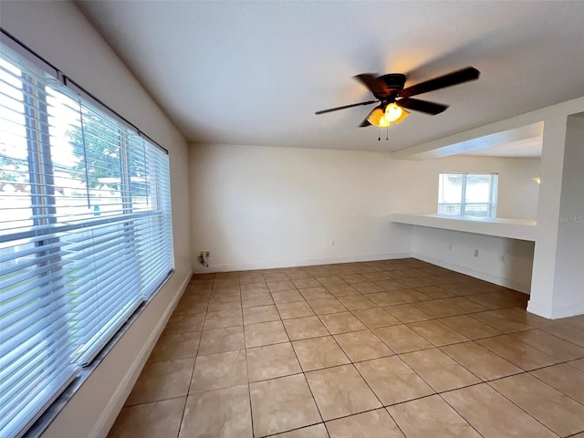 1325 Bella Coola Dr, Orlando, FL 32828 - empty room featuring light tile patterned floors and ceiling fan