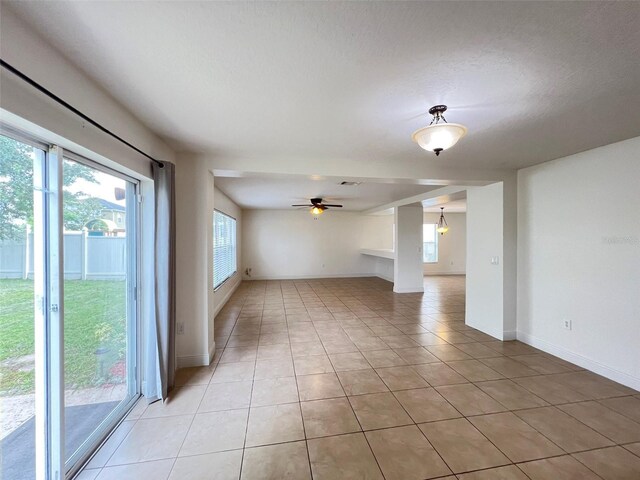 1325 Bella Coola Dr, Orlando, FL 32828 - unfurnished room with light tile patterned floors and a ceiling fan