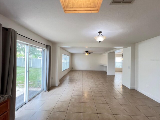 1325 Bella Coola Dr, Orlando, FL 32828 - spare room featuring ceiling fan and light tile patterned flooring