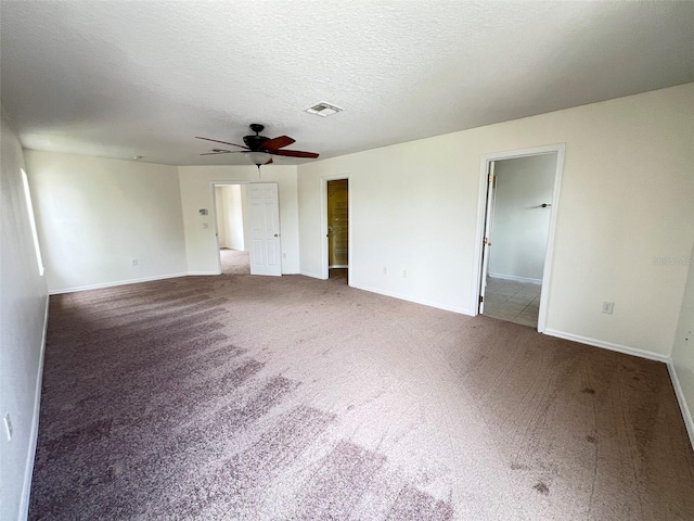 1325 Bella Coola Dr, Orlando, FL 32828 - carpeted empty room with ceiling fan and a textured ceiling