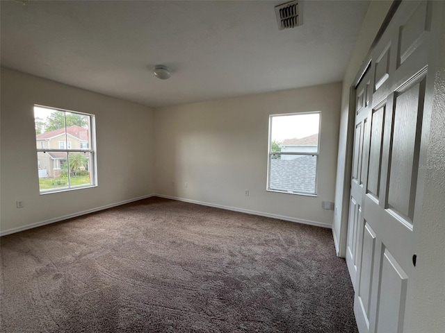 1325 Bella Coola Dr, Orlando, FL 32828 - spare room featuring carpet flooring