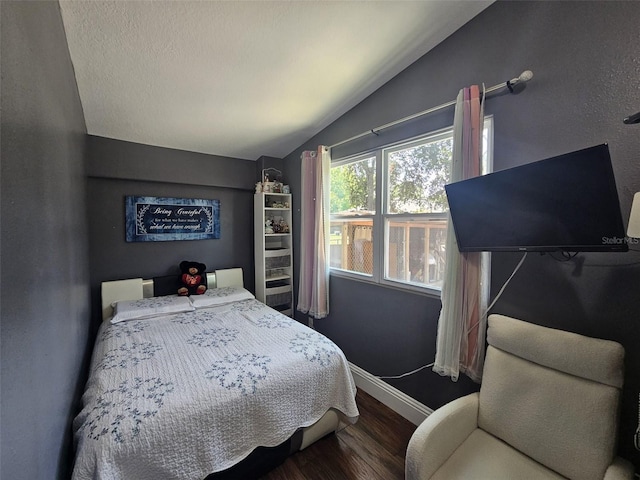 6436 Fig Leaf St, Magnolia Square, FL 34771 - bedroom featuring lofted ceiling, wood finished floors, and baseboards