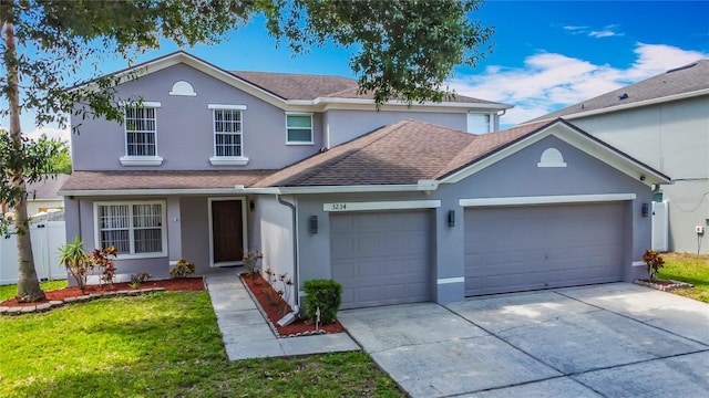 3234 Amberley Park Cir, Kissimmee, FL 34743 - traditional-style home with stucco siding, a garage, driveway, and a shingled roof