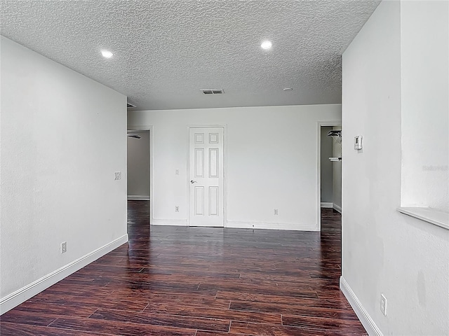 3234 Amberley Park Cir, Kissimmee, FL 34743 - unfurnished room featuring wood finished floors, baseboards, a textured ceiling, and recessed lighting