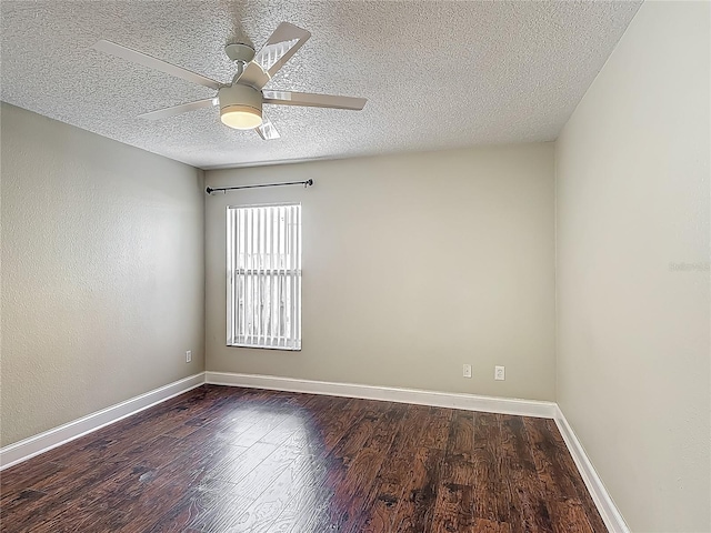 3234 Amberley Park Cir, Kissimmee, FL 34743 - empty room with a textured ceiling, dark wood-style floors, baseboards, and a ceiling fan