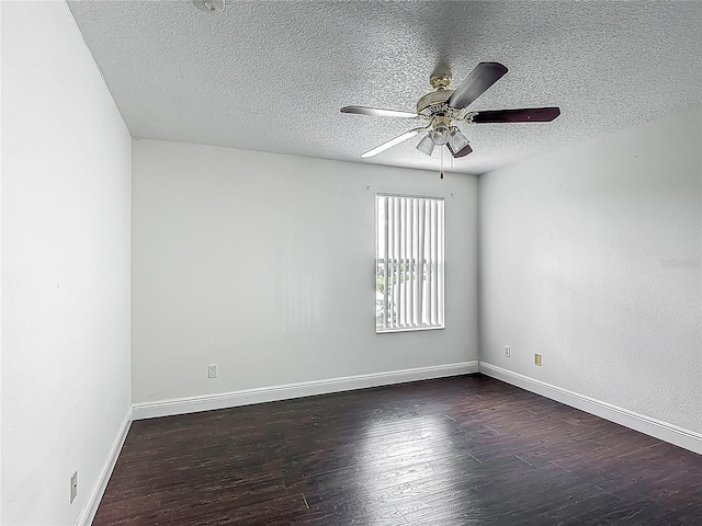 3234 Amberley Park Cir, Kissimmee, FL 34743 - spare room featuring dark wood finished floors, a textured ceiling, a ceiling fan, and baseboards