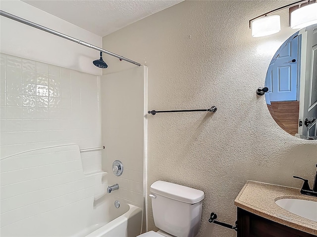 3234 Amberley Park Cir, Kissimmee, FL 34743 - full bath featuring a textured wall, toilet, vanity, and  shower combination