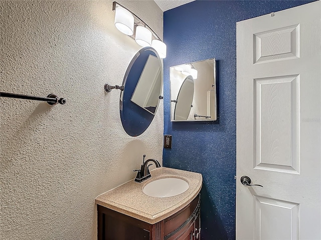 3234 Amberley Park Cir, Kissimmee, FL 34743 - bathroom featuring vanity and a textured wall