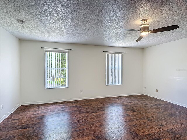 3234 Amberley Park Cir, Kissimmee, FL 34743 - empty room featuring wood finished floors, a textured ceiling, ceiling fan, and baseboards