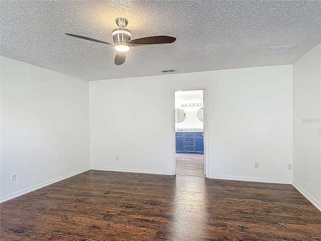 3234 Amberley Park Cir, Kissimmee, FL 34743 - empty room with wood finished floors, ceiling fan, a textured ceiling, and baseboards