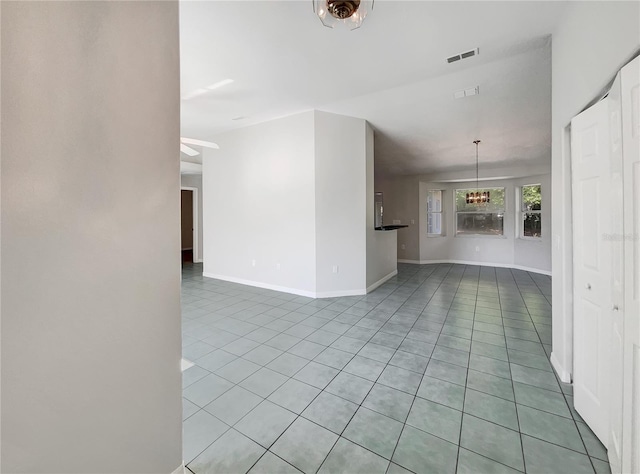 10350 SW 62nd Terrace Rd, Ocala, FL 34476 - unfurnished living room featuring tile patterned floors, baseboards, and ceiling fan