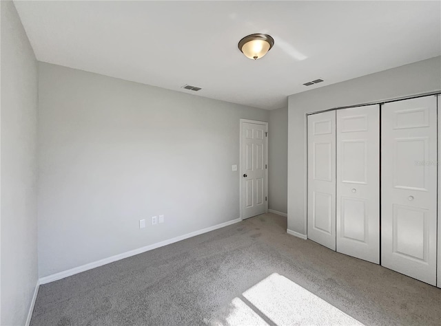 10350 SW 62nd Terrace Rd, Ocala, FL 34476 - unfurnished bedroom featuring baseboards, carpet flooring, and a closet