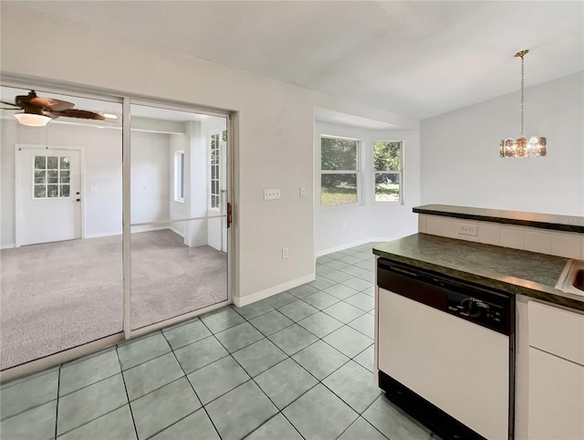 10350 SW 62nd Terrace Rd, Ocala, FL 34476 - kitchen featuring white dishwasher, dark countertops, white cabinets, a chandelier, and lofted ceiling