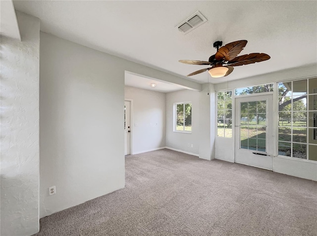 10350 SW 62nd Terrace Rd, Ocala, FL 34476 - empty room with carpet flooring and a ceiling fan