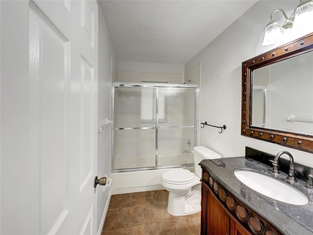 10350 SW 62nd Terrace Rd, Ocala, FL 34476 - full bath featuring toilet, vanity, and shower / bath combination with glass door